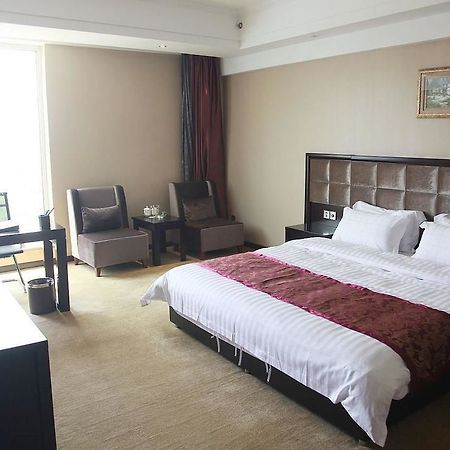 Weishi International Hotel Qing Zhou 外观 照片
