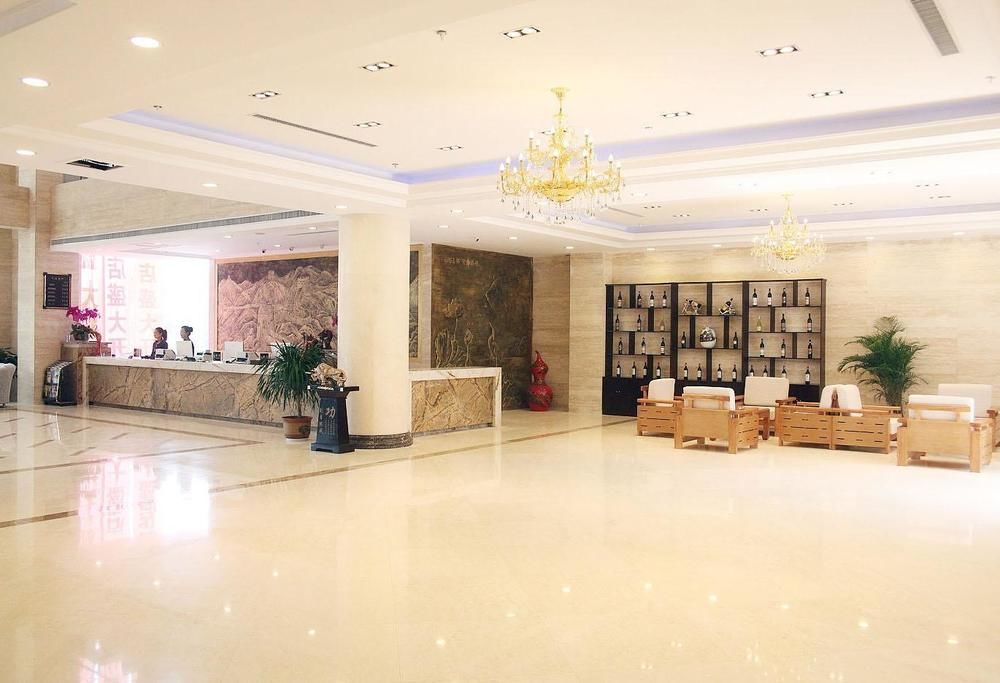 Weishi International Hotel Qing Zhou 外观 照片