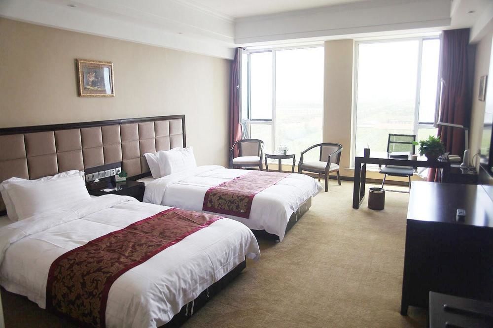 Weishi International Hotel Qing Zhou 外观 照片