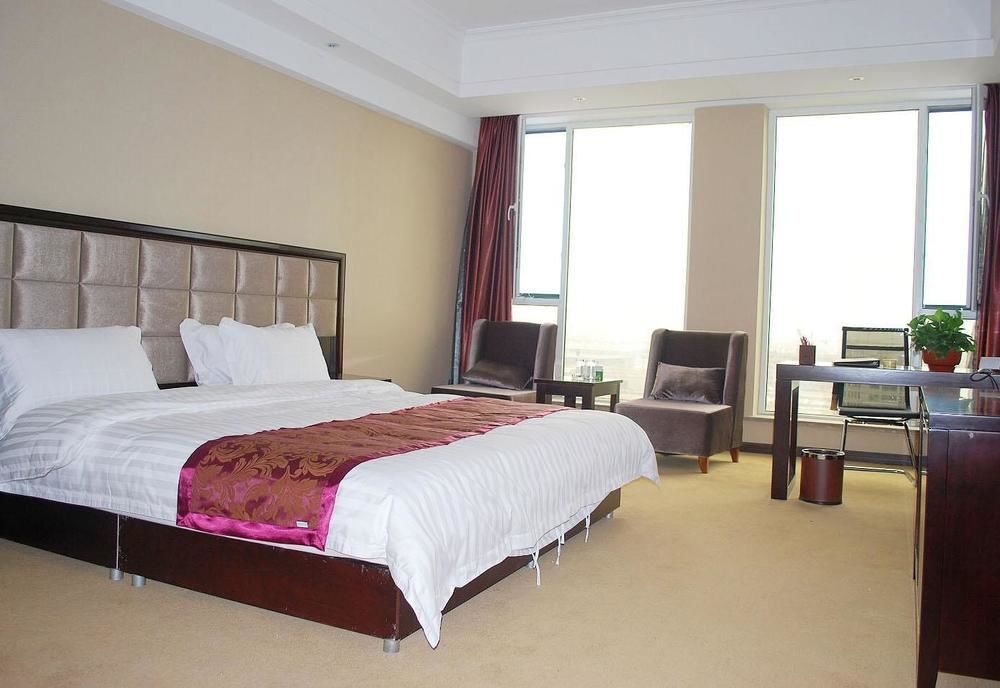 Weishi International Hotel Qing Zhou 外观 照片