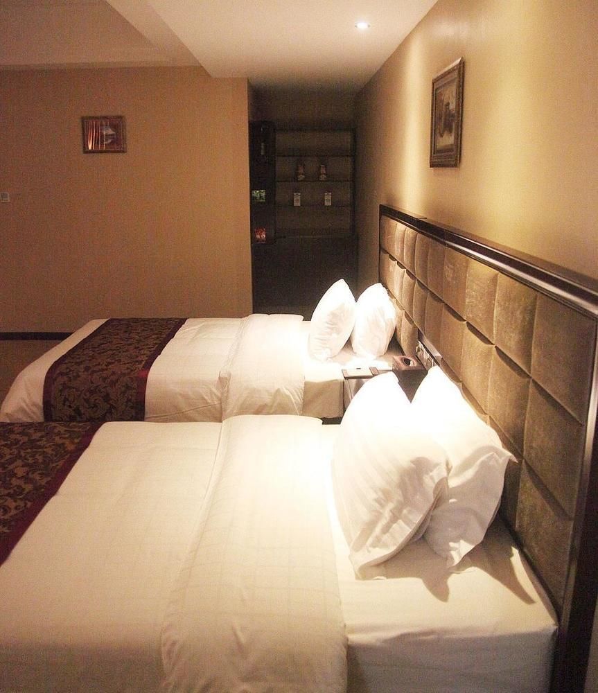 Weishi International Hotel Qing Zhou 外观 照片