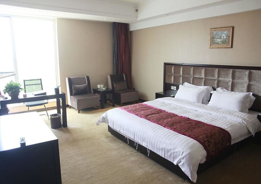 Weishi International Hotel Qing Zhou 外观 照片
