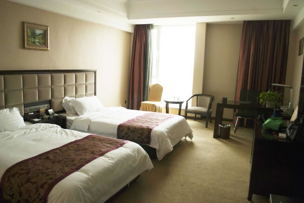 Weishi International Hotel Qing Zhou 外观 照片