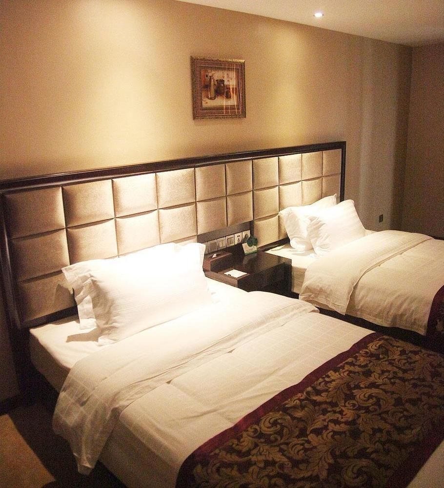 Weishi International Hotel Qing Zhou 外观 照片