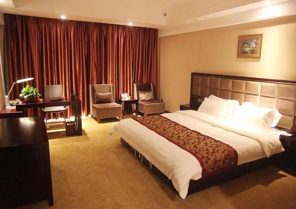 Weishi International Hotel Qing Zhou 外观 照片
