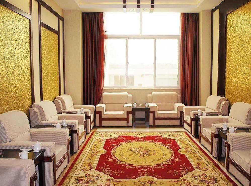 Weishi International Hotel Qing Zhou 外观 照片